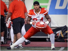 B.C. Lions' DeQuin Evans stretches on the sideline prior to Canadian Football League game against the Montreal Alouettes in Montreal Thursday July 6, 2017.