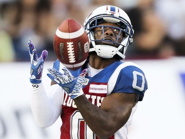 Montreal Alouettes kick returner Stefan Logan cathes a punt against the British Columbia Lions during first half of Canadian Football League game in Montreal Thursday July 6, 2017.