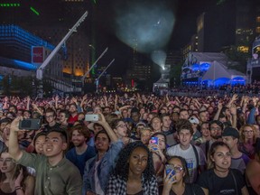 The crowd at the main stage wait for a performance by Anderson.Paak at the outdoor blowout concert at the Montreal International Jazz Festival, in Montreal, on Saturday, July 8, 2017.