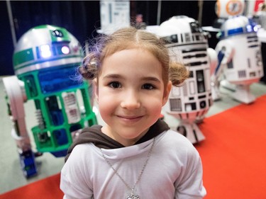 Leia Delisle Fournier, dressed as Princess Leia, poses for a picture as she attends Comiccon with her mother in Montreal on Sunday July 9, 2017.