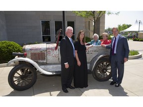 John Butte, left, wife Carmen and Ford Motor Company executive chairman William Clay Ford pose with "The Silver Streak" and Gypsy Coeds Winnie Swearengen Hays, in red dress, and the late Helen Fuertges Hickey.