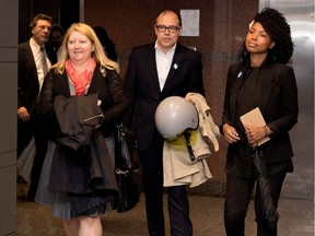 MUHC union leaders, from left, Denyse Joseph, Manuel Fernandes, Sandra Etienne leave after meeting Health Minister Gaetan Barrette at his office in Montreal July 13, 2017.