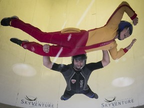 Camille Vilandre gets a feel for skydiving with instructor Guillaume Boileau at SkyVenture in Laval.