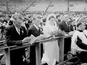 July 23, 1939: 105 Roman Catholic couples were married simultaneously at the Delormier Downs baseball stadium during the annual congress of the Jeunesse Ouvrière Catholique (JOC).