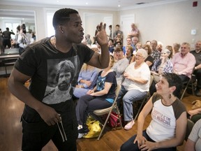 Comedian Godfrey performs for patients at Hope and Cope’s Cancer Wellness Centre on Thursday. Distracting patients from their pain and treatment is "the best gift I can give anybody," says Jodi Lieberman, co-founder of Comedy Gives Back.