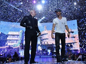 Pitbull, left, and Enrique Iglesias in 2014.
