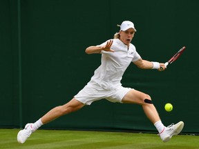 Denis Shapovalov of Canada plays a forehand during the Gentlemen's Singles first round match against Jerzy Janowicz of Poland on Day 1 of the Wimbledon Lawn Tennis Championships at the All England Lawn Tennis and Croquet Club on July 3, 2017 in London, England.