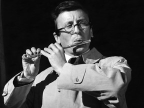 French actor Claude Rich pictured in 1960 playing a transverse flute.
Rich, one of the most familiar figures of French cinema, died aged 88 on July 20, 2017 at his home in the Parisian region following an illness.