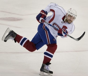 Montreal Canadiens' Andrei Markov takes a shot during a morning skate at the Mellon Arena in Pittsburgh Pennsylvania Wednesday May 12th 2010.