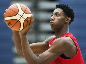 R.J. Barrett, 17, practices his shot with members of the U19 basketball Canada team during practice in Mississauga, Ont., on Tuesday, June 20, 2017.