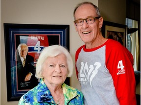 Maccabi Canada's Gary Ulrich and Élise Béliveau pose in front of a picture of her late husband, Canadiens legend Jean Béliveau. The Canadian team at the Maccabiah Games will honour Jean Bélieveau's memory by wearing his No. 4 on their sleeves during the opening ceremonies.