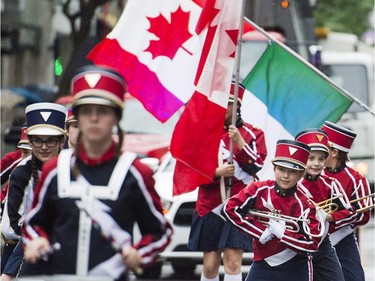 A marching band entertains the crowd during the annual Canada Day parade in Montreal, Saturday, July 1, 2017.