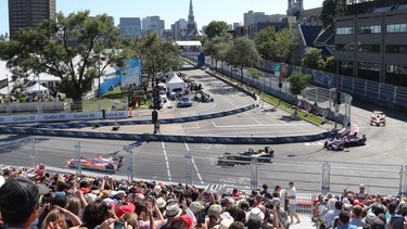 Drivers pass through the first turn at the Montreal Formula ePrix electric car race on Sunday, July 30, 2017.