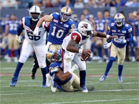 Winnipeg Blue Bombers defensive-end Jackson Jeffcoat (94) sacks Montreal Alouettes quarterback Darian Durant (4) during the first half of CFL football action in Winnipeg on Thursday, July 27, 2017.