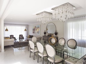 The living and dining areas of Fany and Mitchell Ettinger's renovated bungalow in Hampstead. Large, gleaming tiles carry through the entire main floor, giving it a modern feel.