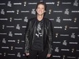 Actor Jim Carrey poses as he arrives for the Just for Laughs awards show at the annual comedy festival in Montreal on Friday, July 28, 2017.