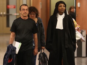 Michel Cadotte with lawyer Elfriede Duclervil at the Montreal courthouse July 25, 2017.