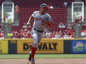 Washington Nationals' Ryan Zimmerman runs the bases after hitting a solo home run off Cincinnati Reds starting pitcher Scott Feldman in the first inning of a baseball game, Monday, July 17, 2017, in Cincinnati. Zimmerman's became the Nationals' career home run leader with 235. (AP Photo/John Minchillo)