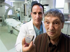 Dr. Vidal Essebag displays a new type of heart defibrillator unit that was implanted in Maurice Des Alliers at the Montreal General Hospital.