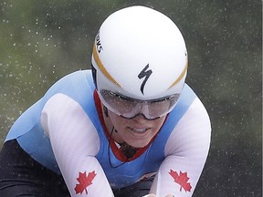 Karol-Ann Canuel of Canad, competes in the women's road cycling individual time trial at the 2016 Summer Olympics in Rio de Janeiro, Brazil, Wednesday, Aug. 10, 2016.