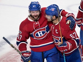 Montreal Canadiens' Alexander Radulov with Max Pacioretty after Radulov scored the game winning goal against New York Rangers during a playoff game at the Bell Centre in Montreal on Friday April 14, 2017.
