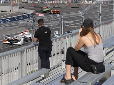 Lonely fans watch practice from the grandstand near Papineau and Viger Aves. at the Formula E site in Montreal on Saturday, July 29, 2017.