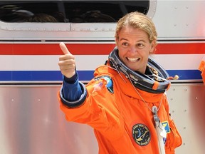 Canadian Space Agency astronaut Julie Payette joins the crew of the space shuttle Endeavour STS-127 as they walk out to the astrovan on July 15, 2009 at the Kennedy Space Center in Florida.