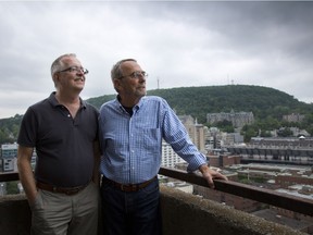 René LeBoeuf and Michael Hendricks at their home in Montreal Thursday June 11, 2015. Hendricks was active in advocating for LGTB rights following the Sex Garage raids in 1990. (Vincenzo D'Alto / Montreal Gazette)