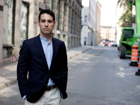 Adam Lackman stands near his home in Old Montreal on Thursday August 3, 2017. Lackman's house was raided and his computers taken by a group of telecom companies who are suing him.