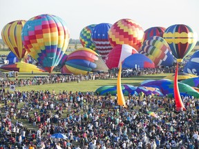 Spectators can get an up-close view of balloons preparing for takeoff at the International Balloon Festival of St-Jean-sur-Richelieu.