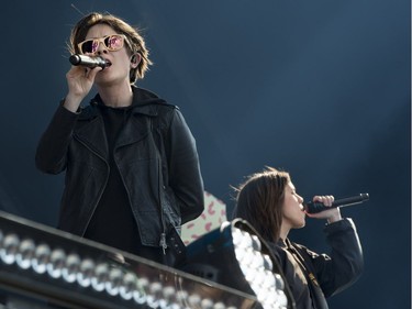 Tegan, left, and Sara perform during Day 3 of the Osheaga Music and Arts Festival at  Parc Jean-Drapeau in Montreal on Sunday, Aug. 6, 2017.