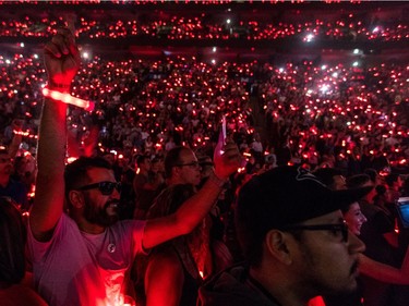 Fans light it up for Coldplay at the Bell Centre in Montreal on Tuesday, August 8, 2017.