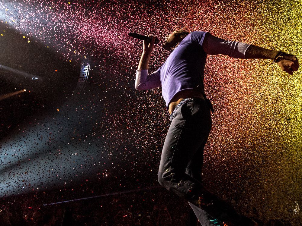 Will Champion from band Coldplay during rehearsals for a special