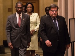 Foreign Affairs Minister for Haiti Antonio Rodrigue, left, and Minister for Haitians Living Abroad Stéphanie Auguste met with Montreal Mayor Denis Coderre, right, in Montreal, on Tuesday, August 8, 2017.