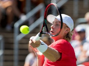 Denis Shapovalov (CAN) returns the ball to Rogerio Dutra Silva (BRA) during the Rogers Cup in Montreal on Tuesday August 8, 2017.