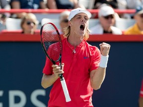 Canada's Denis Shapovalov reacts after winning point against Brazil's Rogerio Dutra Silva at the Rogers Cup Tuesday afternoon in Montreal.