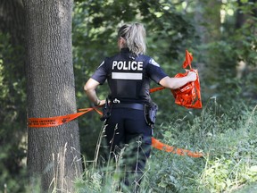 Police closed off the entrances and exits to Mount Royal Park before announcing they had arrested a suspect.