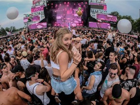 IleSoniq got under way and Thea Toutoungy had an elevated view of the festivities at Parc Jean Drapeau in Montreal, on Friday, August 11, 2017 thanks to Angelo Vitlale.