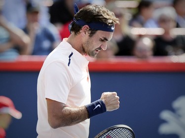 Roger Federer pumps his fist after winning a point during his straight-set victory over Robin Hasse in the semi-final match of the Rogers Cup tennis tournament in Montreal on Saturday August 12, 2017.