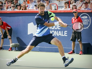 Robin Hasse chases down a backhand return during his straight-set defeat at the hands of Roger Federer in the semi-final match of the Rogers Cup tennis tournament in Montreal on Saturday August 12, 2017.