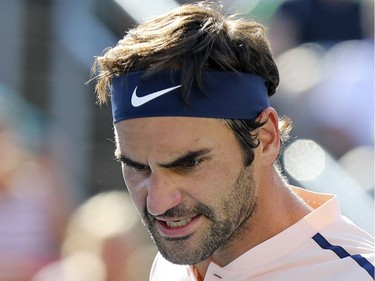Roger Federer reacts with anger after losing a point during championship match against Alexander Zverev at the Rogers Cup tennis tournament at Uniprix Stadium in Montreal on Sunday, August 13, 2017.