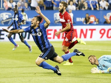 Montreal Impact's Matteo Mancosu is tripped up by Chicago Fire goalkeeper Matt Lampson during first half of MLS action in Montreal on Wednesday August 16, 2017. The Impact scored on the subsequent penalty kick.