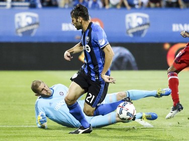 Chicago Fire goalkeeper Matt Lampson makes a save on a shot by Montreal Impact's Matteo Mancosu during first half of MLS action in Montreal on Wednesday August 16, 2017.