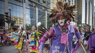 Members of Canada's Indigenous community lead the Canada Pride parade along René-Lévesque Blvd. in Montreal on Sunday, August 20, 2017.