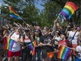 The streets were packed with onlookers dressed to enjoy the day as they watched the Pride parade along Boulevard René-Lévesque  in Montreal, on Sunday, August 20, 2017.