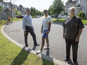 Frank Bomba (from left), Faz Sham and Ken Matziorinis don't want a daycare built on Eldor-Daigneault Street in Pierrefonds.