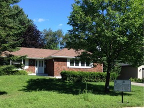 The owner of this brick bungalow on Bras D'Or Ave. wants it to be torn down and the lot subdivided for two new homes.