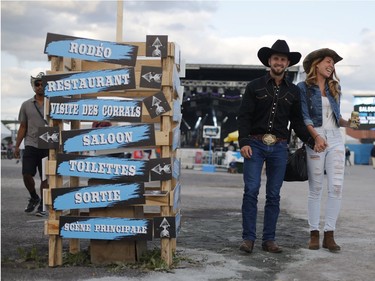 Jonathan Martin and Stéphanie Beaulieu attend their first rodeo in the Old Port of Montreal, Aug. 24, 2017.