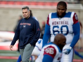 Montreal Alouettes head coach Jacques Chapdelaine walks the field during the pregame warmup during CFL action at Molson Stadium in Montreal on Thursday August 24, 2017.