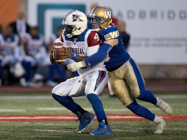 Montreal Alouettes quarterback Darian Durant is sacked by Winnipeg Blue Bombers linebacker Sam Hurl during CFL action at Molson Stadium in Montreal on Thursday August 24, 2017.